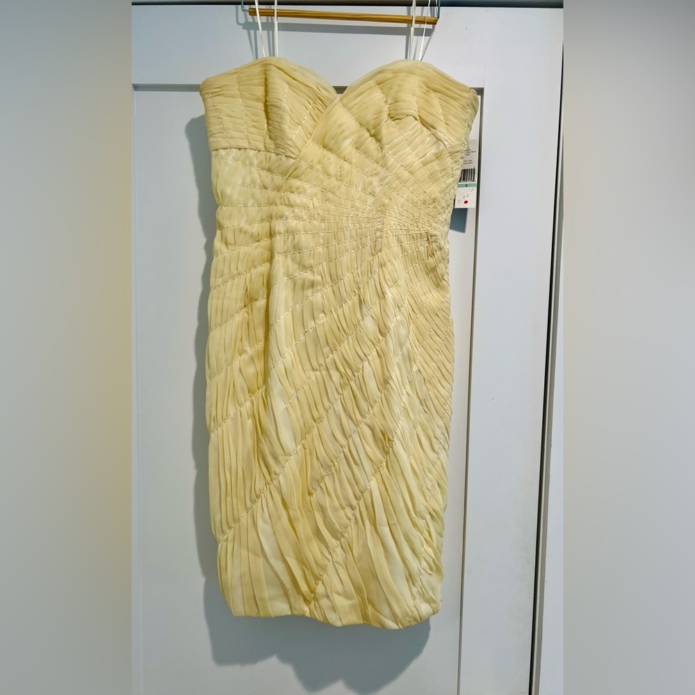 Elegant Cream Pleated Evening Dress with Diagonal Pattern